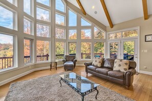 TV, fireplace, DVD player, table football - Osprey Cove - Custom Lakefront home with 2-story dock, Wifi, Game Room and Fireplace (Moneta)