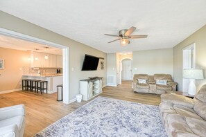 Living area - Serene lakefront home with dock, hot tub, pool table & beautiful views (Huddleston)