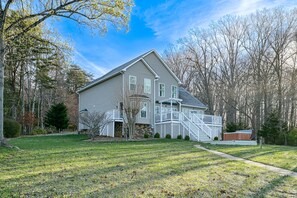 Exterior - Serene lakefront home with dock, hot tub, pool table & beautiful views (Huddleston)