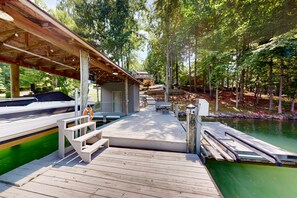 Marina - Pawsitive Retreat - Pet Friendly home with enclosed yard, hot tub, 2 Kayaks, 2 SUPs & inflatables (Huddleston)