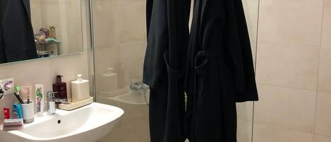 Hair dryer, towels, soap, toilet paper