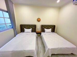 Deluxe Quadruple Room, 2 Double Beds, Private Bathroom | Free WiFi, bed sheets - A Z Hotel Phnom Penh (Phnom Penh)