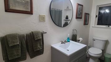 Hair dryer, bidet, towels, soap