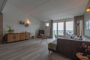 Appartement Deluxe, 2 chambres | Salle de séjour