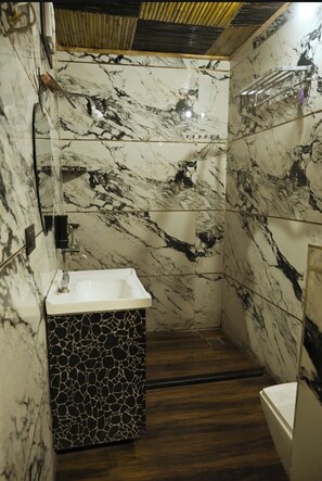 Shower, slippers, towels, soap