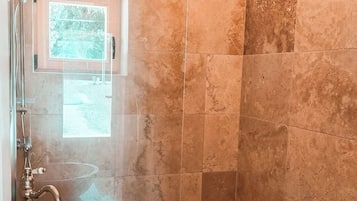 Jetted bath, hair dryer, towels, soap