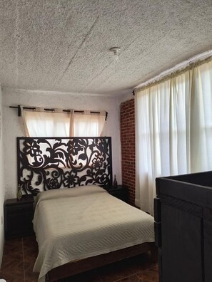 Quarto quádruplo standard, vista para a montanha
