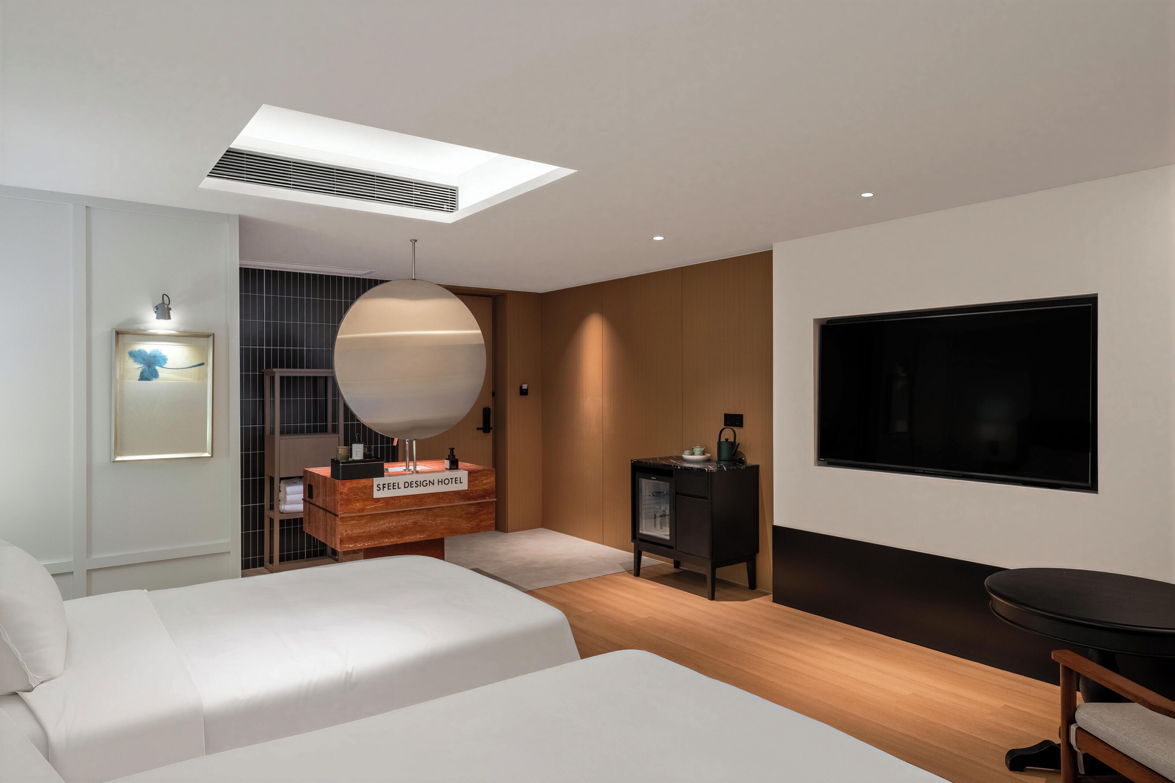 Habitación ejecutiva con 2 camas individuales, vistas a la ciudad | Ropa de cama de alta calidad y decoración individual
