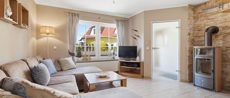 Fernseher, Kamin, DVD-Player, Stereoanlage