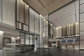 A spacious lobby with high ceilings, large windows, and a reception area. - Four Points by Sheraton Jinan, High-Tech Zone (Jinan)