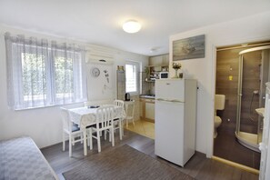 Apartment, 1 Bedroom, Patio, Garden View | Dining room - Cozy Apartment With Garden (Umag)