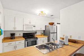 Maison en rangée, Plusieurs lits, patio, vue sur le jardin (Cassine Gardens 133) | Cuisine privée