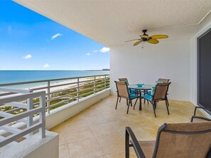 Outdoor dining - Sunsets bathe the Balcony of this 2 Bedroom Beachfront Condo...Savor the Gulf (Marco Island)