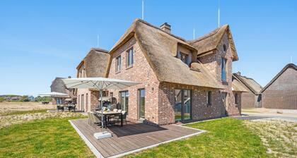 Premium vacation home Große Halbe Düne in the dune park with terrace and sauna