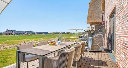 Premium vacation home Große Halbe Düne in the dune park with terrace and sauna