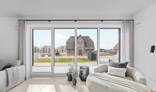Premium vacation home Halber Deich in the dune park with terrace and sauna