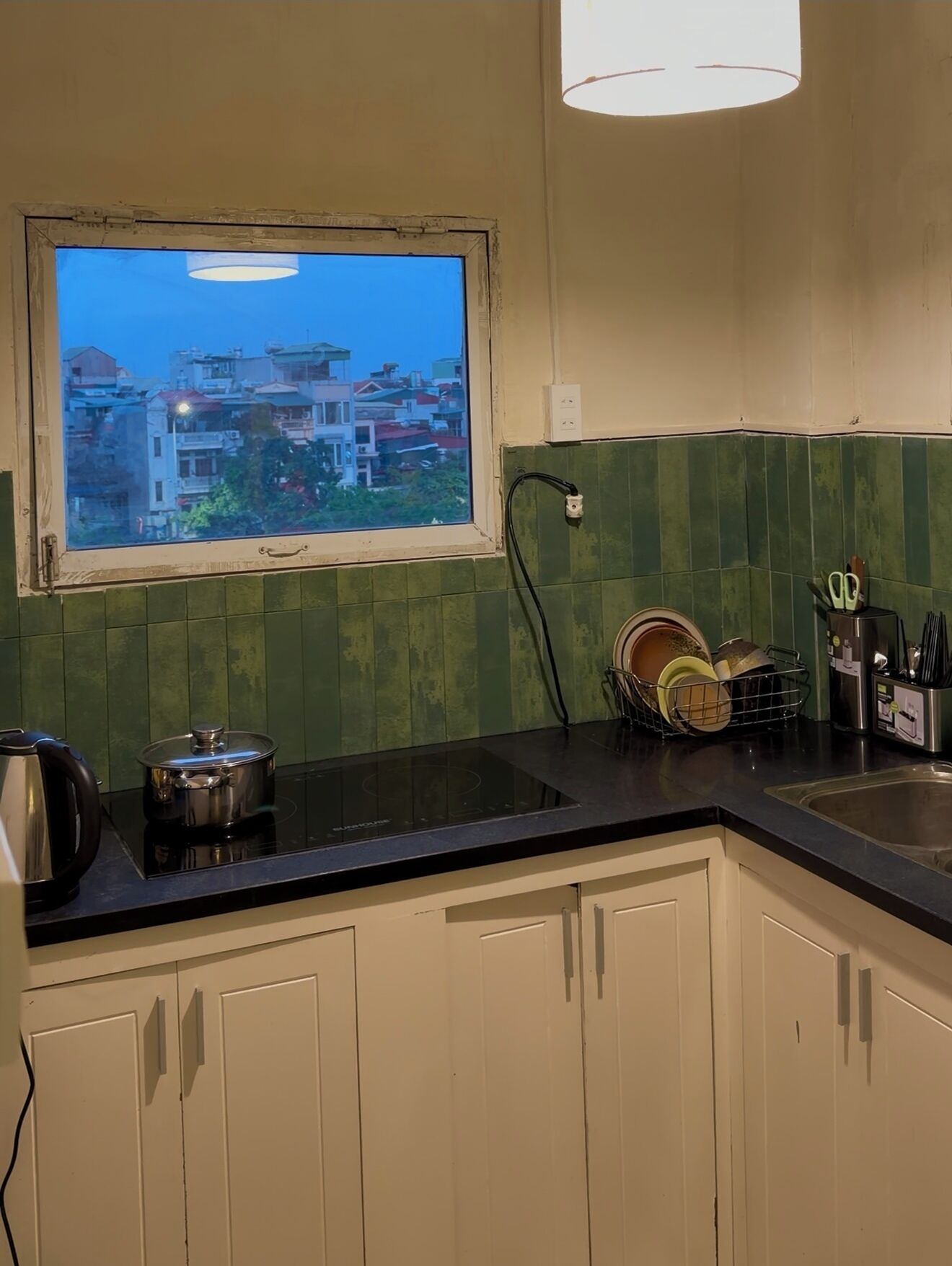 Fridge, microwave, electric kettle, cookware/dishes/utensils