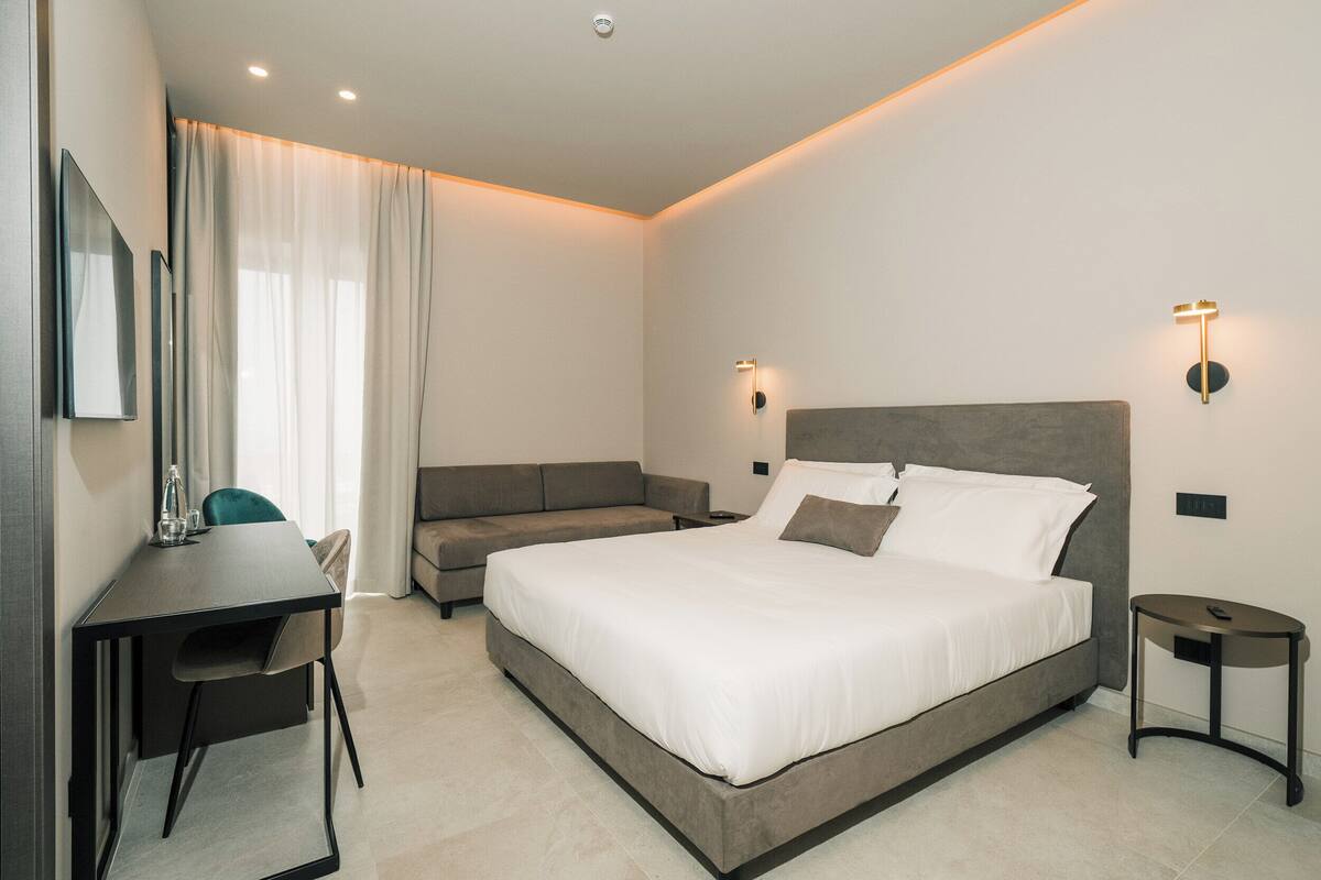 Habitación triple Deluxe, balcón, vista al mar