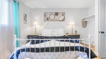 1 bedroom, desk, iron/ironing board, travel crib