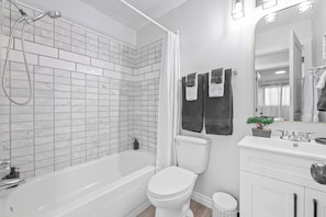 Hair dryer, towels, soap, shampoo
