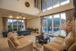 Deluxe Villa | Living area - ELIVAAS Nimishka 5 BHK Villa with Pool (Mawal)