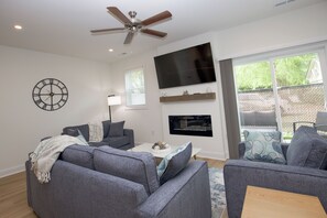 TV, fireplace - The Downtown Pines Retreat - 3BR Southern Pines Townhome (Southern Pines)
