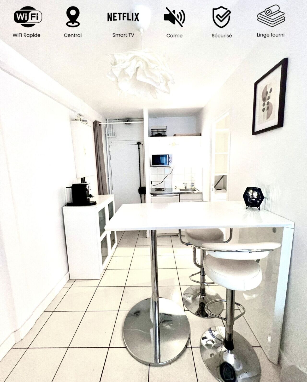 Coffee/tea maker, fridge, microwave, dining table
