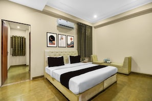 Habitación Deluxe doble, vistas a la ciudad | Cortinas opacas y sistema de insonorización