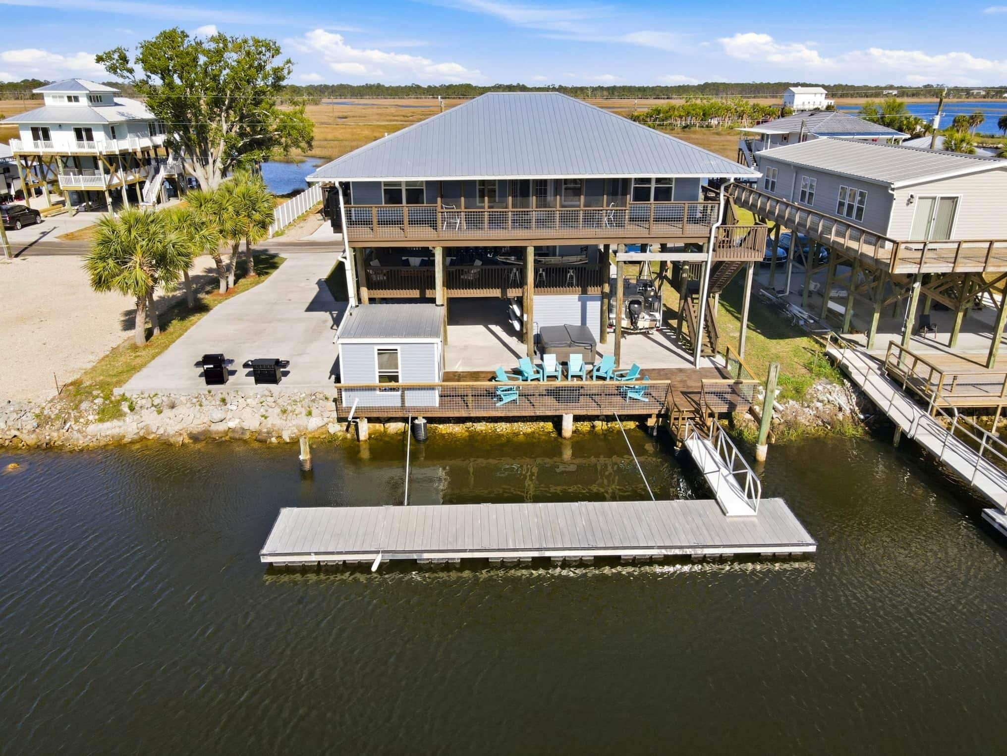 Back of home with 40 ft dock. 