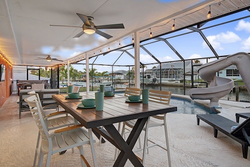 Waterfront Fun Retreat | Pool with Slide, Hot Tub, Dock + Game Room