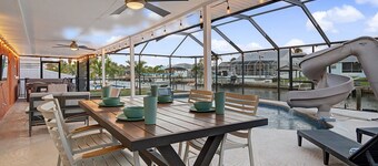 Waterfront Fun Retreat | Pool with Slide, Hot Tub, Dock + Game Room