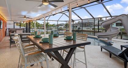 Waterfront Fun Retreat | Pool with Slide, Hot Tub, Dock + Game Room