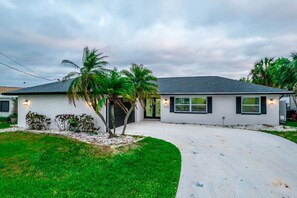 Exterior - Canal Front Getaway | Pool, Dock, Game Room + Screened Porch (Port Richey)