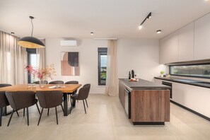 Dining - Villa Riata – The Modern Istrian Escape<br>Luxury villa for up to 8 guests with a private pool, set in a peaceful and green environment near Poreč. (Nova Vas)