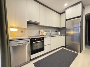 Fridge, oven, stovetop, dishwasher - Newly Built 2BR Residence in Central Şişli (Istanbul)