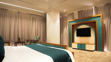 Premium Suite, Garden View | In-room safe, laptop workspace, iron/ironing board, free WiFi