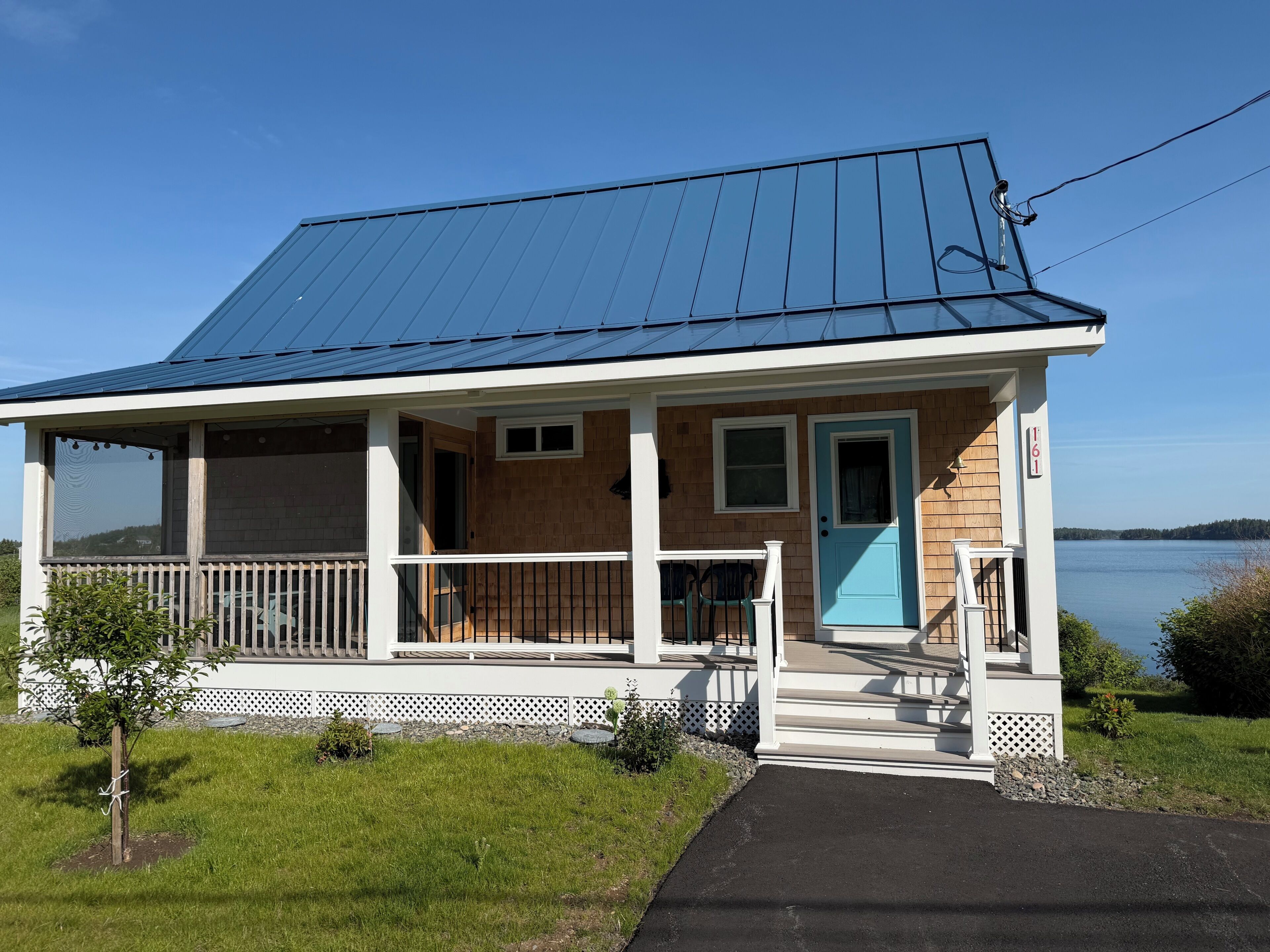 Front of house (streetside) with Johnson Bay in back.