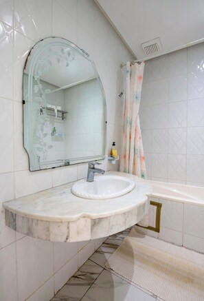 Hair dryer, bidet, towels, soap