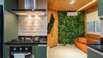 Design Apartment, Kitchen, Courtyard View | Private kitchen | Full-sized fridge, microwave, oven, stovetop