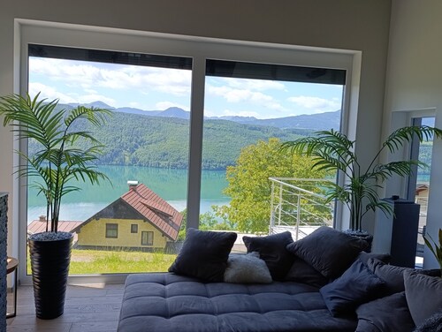Modern house in the woods with a view of the Millstattersee