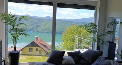 Modern house in the woods with a view of the Millstattersee