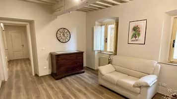 Apartamento luxo, vista para a cidade | Área de estar