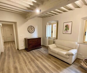 Apartamento luxo, vista para a cidade | Área de estar