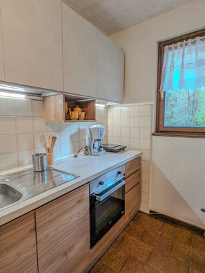 Private kitchen - AlpenDeer: Mountain Charm with Fireplace & View in Oltre il Colle (Oltre il Colle)