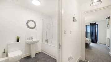 Hair dryer, towels, soap, toilet paper