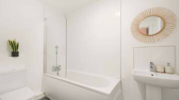 Hair dryer, towels, soap, toilet paper