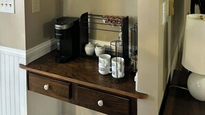 A kitchen with a coffee station, including a Keurig machine, mugs, and a coffee bar sign. -  3-bed 2.5 bath, outdoor pool May 31-Sep 30th/AC/in Bellevue (Bellevue)