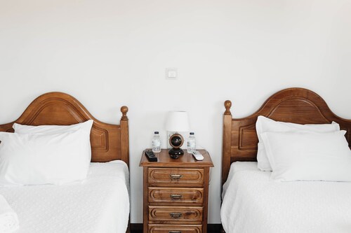 Itinerant Nightfall - Twin suite with balcony by Lethes Legacy