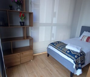 2 dormitorios, tabla de planchar con plancha, wifi gratis y ropa de cama