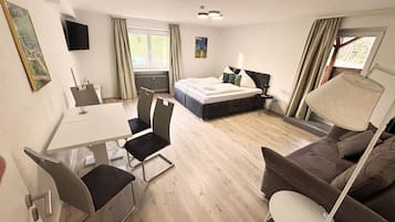 Deluxe Apartment, Resort View | In-room safe, blackout drapes, iron/ironing board, free WiFi